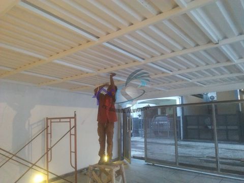 Pemasangan kanopi spandek dan pagar dorong rangka besi carport rumah